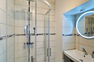 Appartements Appartement spacieux et parking : photos des chambres