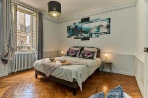 Appartements Appartement spacieux et parking : photos des chambres