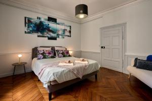 Appartements Appartement spacieux et parking : photos des chambres