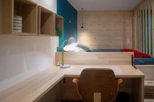 Appartements Grand studio avec terrasse : photos des chambres
