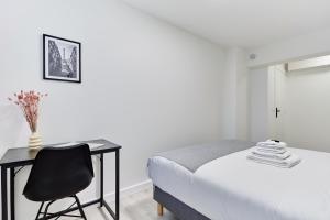 Appartements Elegant 1 chambre climatise Tour Eiffel a pied : photos des chambres