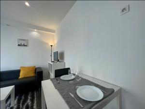 Appartements Confort & cosy - parking : photos des chambres