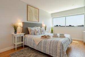 Stylish Home with Balcony & Garage by HostWise