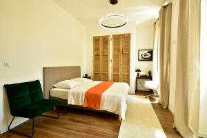 Maisons de vacances Demeure d-exception sur la place de l-eglise : photos des chambres