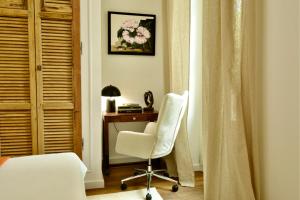 Maisons de vacances Demeure d-exception sur la place de l-eglise : photos des chambres