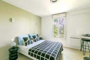 Appartements Studio lumineux a 2 pas des commerces Asnieres - III : photos des chambres