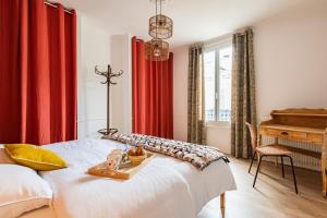 Appartements La Fine Bulle, Appartement de Charme au coeur de Reims : photos des chambres