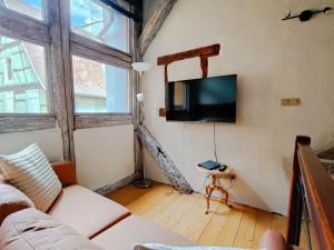 Appartements La Maison Bleue - Historic House in the Heart of Riquewihr : photos des chambres