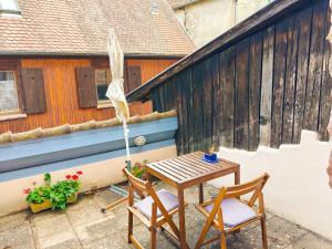 Appartements La Maison Bleue - Historic House in the Heart of Riquewihr : photos des chambres