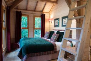 Chalets La Cabane de l-Etang : photos des chambres