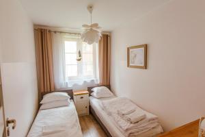 VacationClub - Leśny Dom 16A Apartament 14