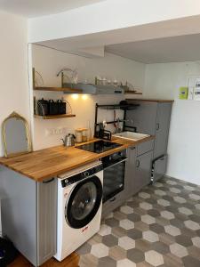 Appartements Studio Cosy au charme Parisien - Butte aux cailles : photos des chambres