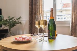 Appartements La Fine Bulle, Appartement de Charme au coeur de Reims : photos des chambres