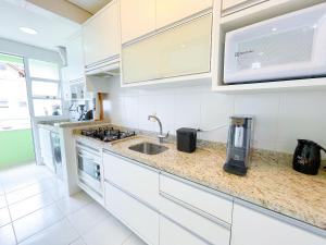 Apê Completo com AC | 500m Praia de Canasvieiras