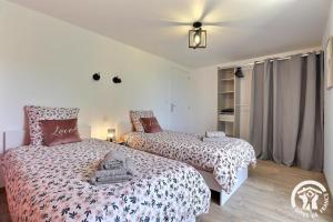 Maisons de vacances Le petit paradis de broceliande : photos des chambres