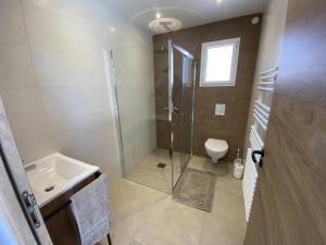 Maisons de vacances Le petit paradis de broceliande : photos des chambres