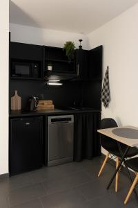 Appartements Jacuzzi, massage et plage ! : photos des chambres