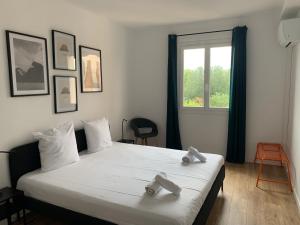 Appartements Appartement familial avec parking privatif : photos des chambres