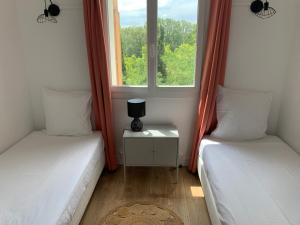 Appartements Appartement familial avec parking privatif : photos des chambres