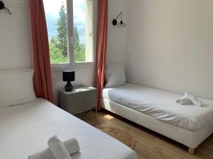 Appartements Appartement familial avec parking privatif : photos des chambres