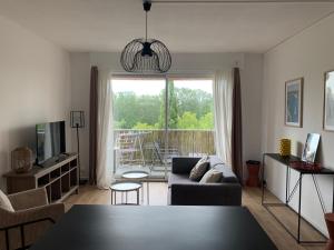 Appartements Appartement familial avec parking privatif : photos des chambres