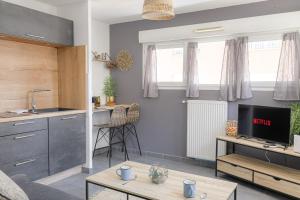 Appartements Cosy et Calme a 80m Tram T3 : photos des chambres