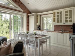 Mysig timmerstuga med utsikt över Tandådalens anläggningar