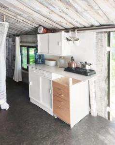 Minimalist riverside hideout