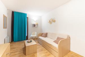 Appartements Un Jardin Au Coeur De Luchon : photos des chambres