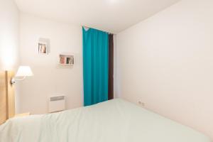 Appartements Un Jardin Au Coeur De Luchon : photos des chambres