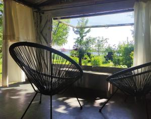 Minimalist riverside hideout