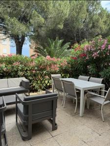 Appartements cosy rez-de-jardin avec piscine, a 3km des plages : photos des chambres