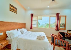 Munnar Ice Pellets Resort with Pool by VOYE HOMES