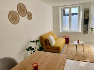 Appartements Charmant appartement en rez-de-chaussee : photos des chambres