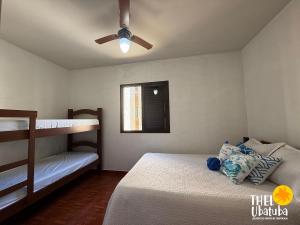 Studio 200 metros da Praia Grande, com roupa de cama 01 dormitório