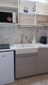 Appartements cocon douillet tout pres arenes Nimes : photos des chambres