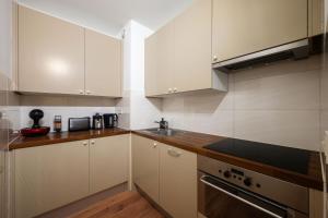 Appartements LE SUN - Central - Piscine collective sur le toit - Wifi : photos des chambres