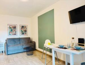 Appartements Grand studio terrasse jardin parking WIFI : photos des chambres