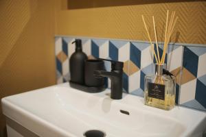 Appartements Jazzy jacuzzi privee parking free centre a 5minutes stationnement privee possible sur demande : photos des chambres