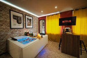 Appartements Jazzy jacuzzi privee parking free centre a 5minutes stationnement privee possible sur demande : photos des chambres