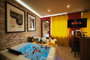 Appartements Jazzy jacuzzi privee parking free centre a 5minutes stationnement privee possible sur demande : photos des chambres