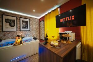 Appartements Jazzy jacuzzi privee parking free centre a 5minutes stationnement privee possible sur demande : photos des chambres