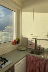 Zonnig Penthouse met Panoramisch Zeezicht