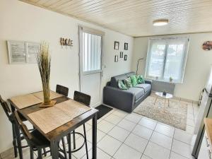 Appartements Into the Wild - T2 Cosy tout confort : photos des chambres