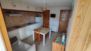 Appartements Appartement chaleureux avec veranda : photos des chambres