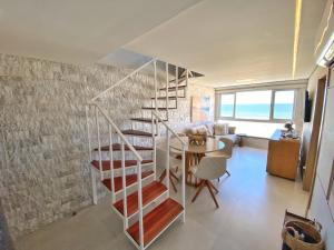 Cobertura duplex de frente para o mar