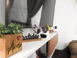 Quarto em apartamento 80 m da praia central