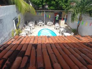 casa jota quarto com ventilador cama solteiro e sofá-cama