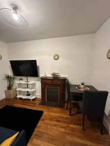 Appartements Charmant Appartement F2 : photos des chambres
