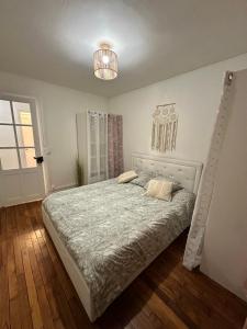 Appartements Charmant Appartement F2 : photos des chambres